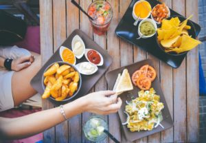 Picture of a variety of food dishes while traveling.