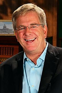 picture of travel expert Rick Steves who weighs in about travel insurance.